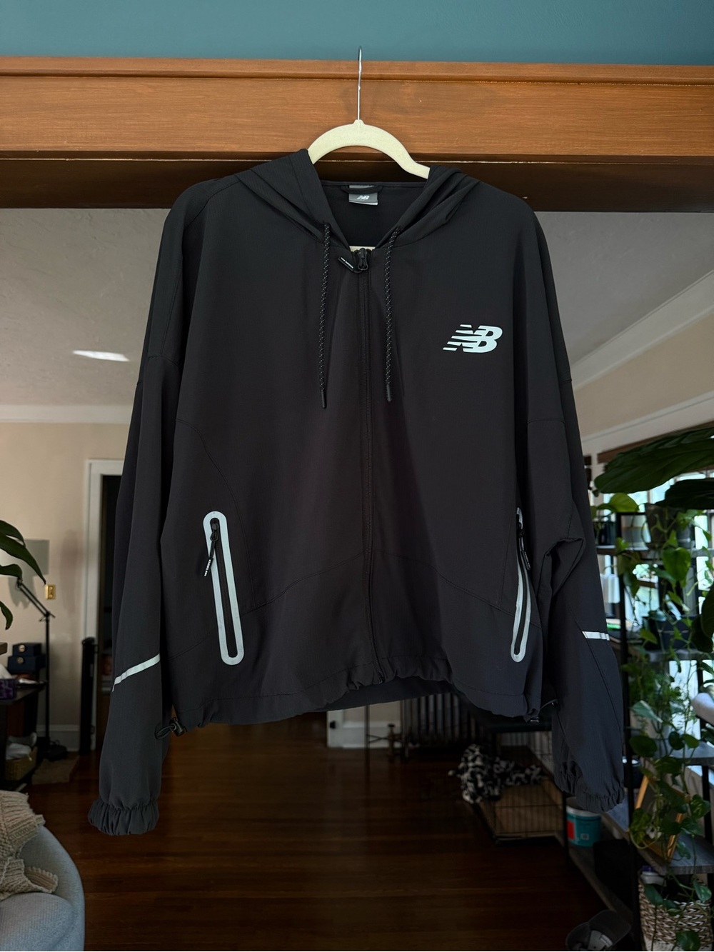 New Balance Black Hooded Performance Jacket with Reflective Trim